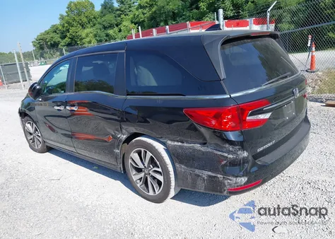2021 Honda Odyssey Touring z USA, uszkodzony, nr VIN 5FNRL6H84MB027396